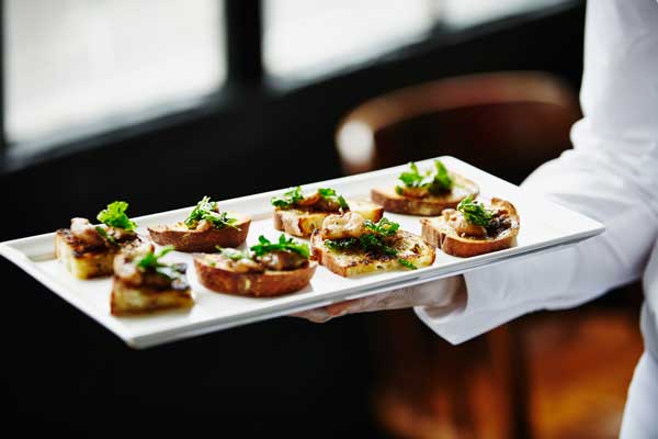 Server with appetizer tray